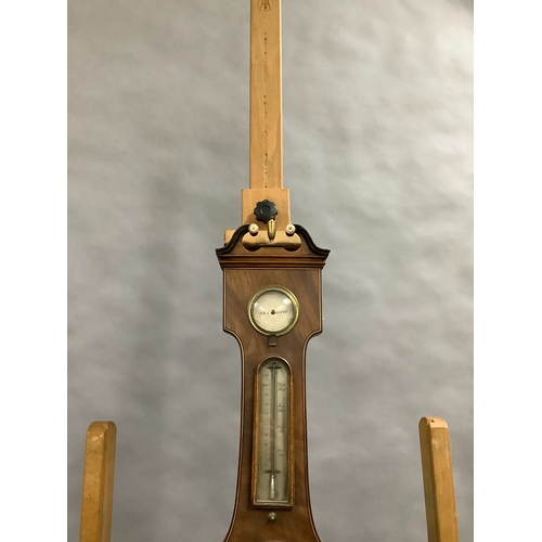 56 - AN EARLY 19TH CENTURY MAHOGANY BANJO BAROMETER-THERMOMETER, having a broken arch pediment with gilt ... 