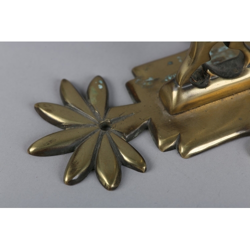 47 - A PAIR OF EARLY 19TH CENTURY BRASS WALL BRACKETS, the back plate with foliate finial, scrolled and p... 