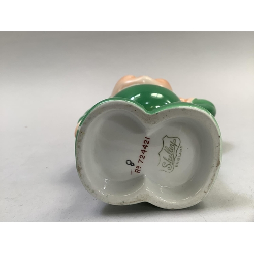 10 - A Shelley vase in the figure of a pixie after Mabel Lucie Attwell, registered number 724421 with She... 