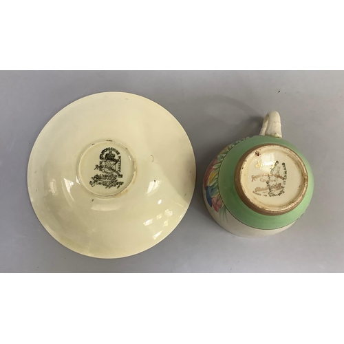 15 - An early Clarice Cliff crocus painted cup and saucer with gilt back-stamp Spring Staffordshire Royal... 
