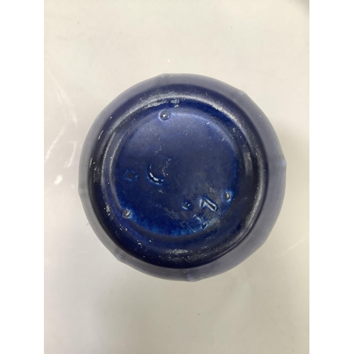 16 - A Royal Lancastrian blue mottle glaze vase having an elongated neck and ribbed circular body, impres... 
