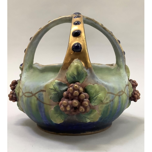 17 - A late 19th/early 20th century amphora basket, the handles formed as a crown gilt with blue glaze du... 