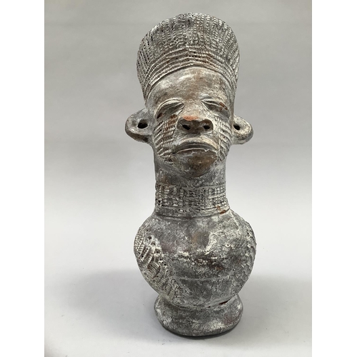 25 - A 20th century terracotta Mangbetu vessel, Republic of Congo, facemask and headdress above a rounded... 