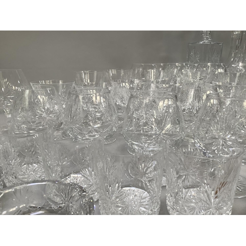 26 - A suite of Edinburgh crystal, star of Edinburgh design, including a set of twelve brandy balloons, t... 
