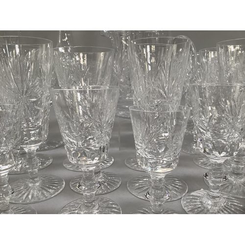 26 - A suite of Edinburgh crystal, star of Edinburgh design, including a set of twelve brandy balloons, t... 