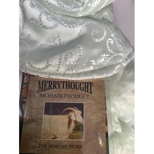 32 - A Merrythought Queen Elizabeth, the Queen Mother, bear, no. 467 of a limited edition of 2500, in pal... 