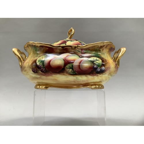 41 - A Sovereigndale fruit painted two handled tureen and domed cover with loop handle painted with apple... 