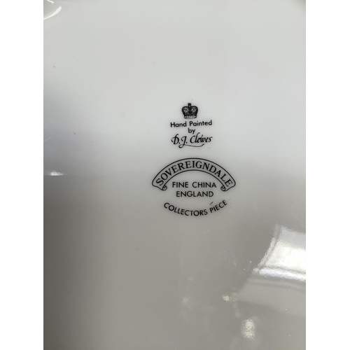 41 - A Sovereigndale fruit painted two handled tureen and domed cover with loop handle painted with apple... 