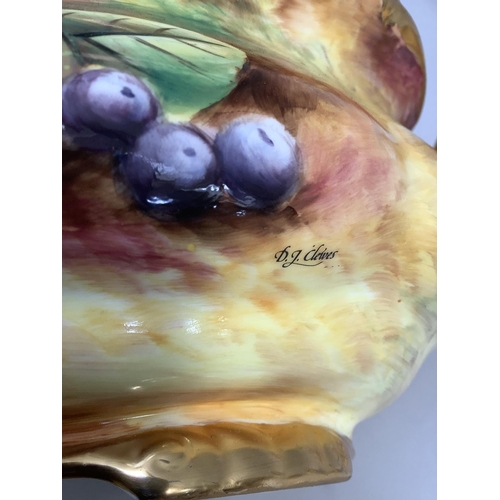 41 - A Sovereigndale fruit painted two handled tureen and domed cover with loop handle painted with apple... 