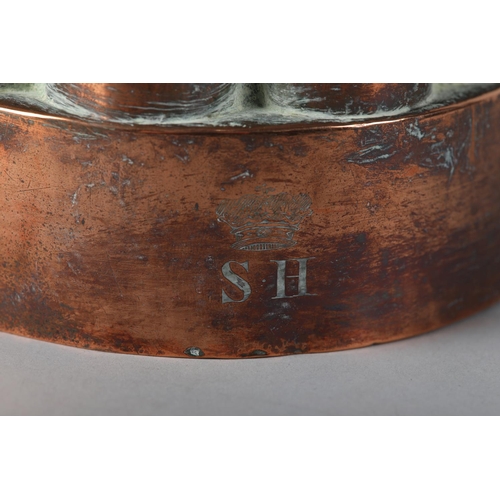 3 - A 19th century copper jelly mould with central pipe, engraved with coronet over SH, 13.5cm diameter ... 