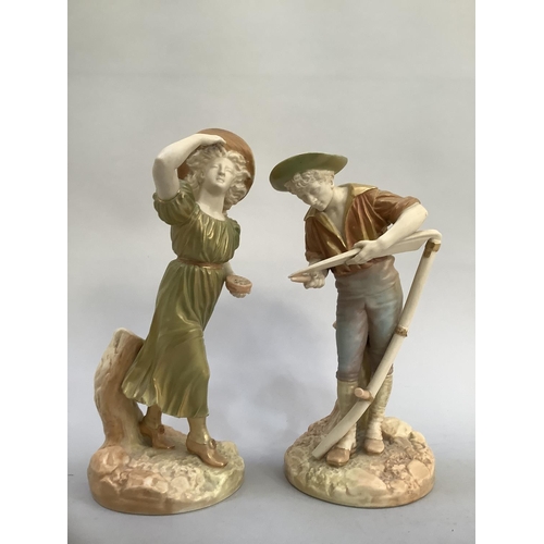 5 - A pair of Royal Worcester blush ivory and pale green gilded figures of a girl holding a nest of bird... 