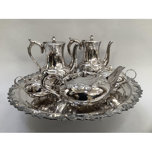 51 - A Kenson EPNS four piece tea and coffee service comprising circular compressed teapot, hot water jug... 