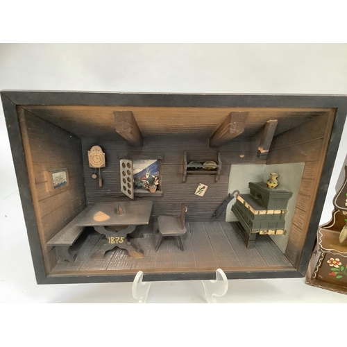 53B - A musical Swiss chalet jewellery box, a longcase clock, a musical toilet roll holder, a musical two-... 