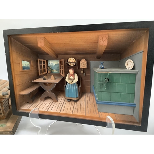 53B - A musical Swiss chalet jewellery box, a longcase clock, a musical toilet roll holder, a musical two-... 