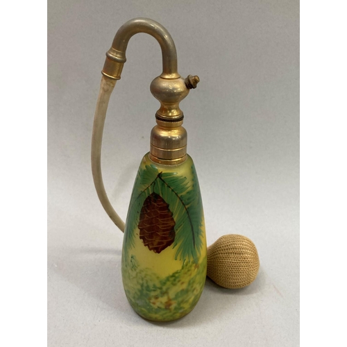 34 - A French yellow-green mottled and opaque cased scent bottle painted with pinecones and signed JAM wi... 