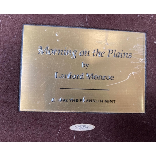 37 - A bronze effect cast sculpture of two horses galloping entitled 'Morning On The Plains' by Langford ... 