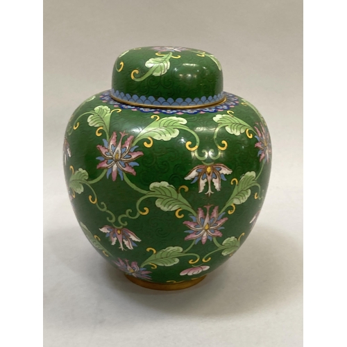 11 - A Chinese cloisonné ginger jar and cover, the green ground worked with flower heads and tendrils, 19... 