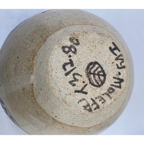 4 - A Tonalá pottery vase from Tonalá, Jalisco, Mexico, the ovoid body painted with ovals and a zigzag b... 