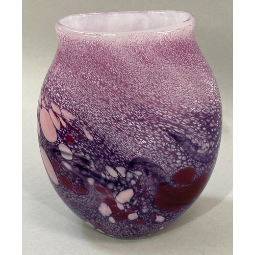 7 - A studio glass vase form the National Glass Centre of flattened ovoid form, the glass marbled in pin... 