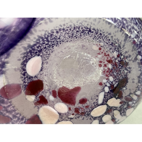 7 - A studio glass vase form the National Glass Centre of flattened ovoid form, the glass marbled in pin... 