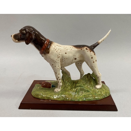 41 - A Royal Doulton pottery figure of a Pointer and pheasant, 17cm height