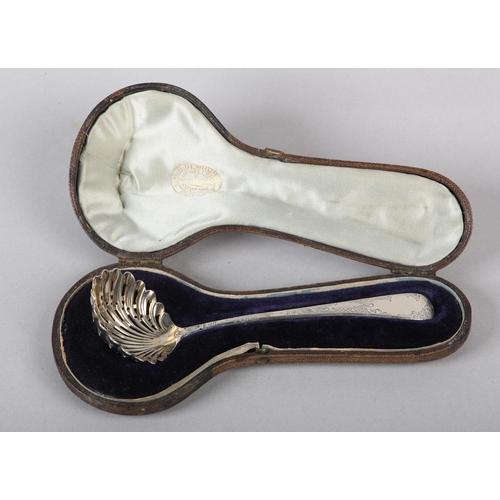 177 - A GEORGE III SILVER  SUGAR SIFTING SPOON, London 1899 for I B, Hanoverian pattern with pierced scall... 