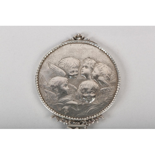 181 - A VICTORIAN SILVER MOUNTED HAND MIRROR, London 1887 for Edward Brown, cherub and foliate chased, set... 