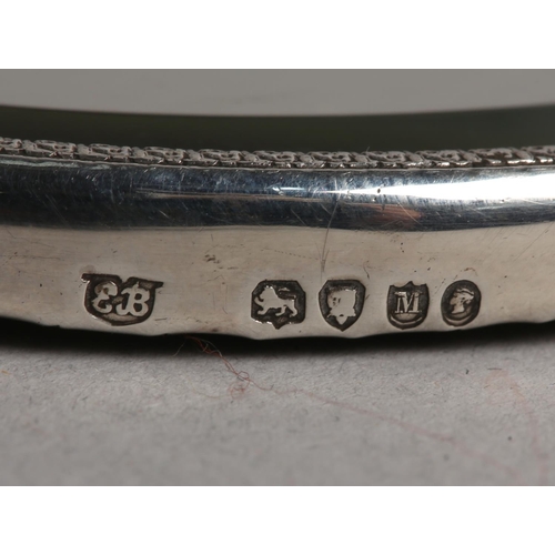 181 - A VICTORIAN SILVER MOUNTED HAND MIRROR, London 1887 for Edward Brown, cherub and foliate chased, set... 