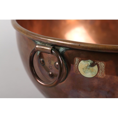 23 - A 19TH CENTURY BENHAM & FROUD COPPER WHISKING BOWL with pendant ring, stamped with cross and orb tra... 