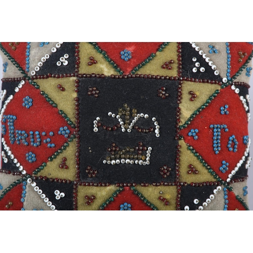 16 - A VICTORIAN BEADWORK LOVE TOKEN of square outline, yellow, white, black and red patchwork felt borde... 