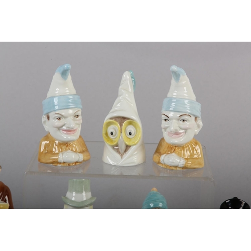50 - SEVEN ROYAL WORCESTER PORCELAIN CANDLE SNUFFERS, including Monk, Toddie, Budge, Mandarin, Owl, Punch... 