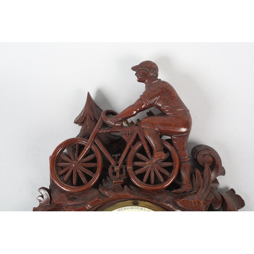 35 - A GERMAN BLACK FOREST CARVED CYCLIST'S BAROMETER, the instrument signed to the dial Vanderlyk Holost... 