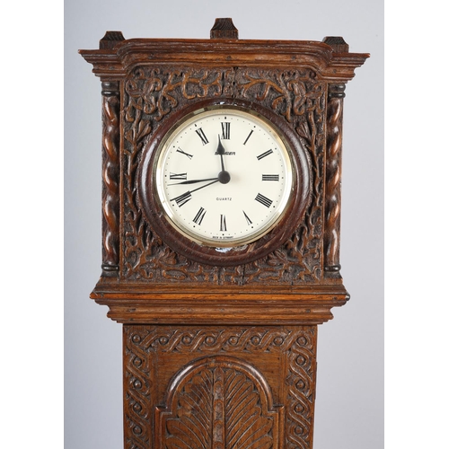 36 - A VICTORIAN MINIATURE OAK LONGCASE CLOCK CASE, having a square hood carved with tendrils flanked by ... 