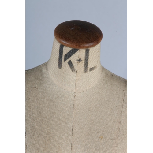 19 - A MINIATURE MANNEQUIN BY KENNETT & LINDSELL LTD, the body stencilled with maker's name, on a metal s... 