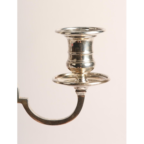 179 - A PAIR OF GEORGE V SILVER CANDELABRA, London 1937, for Thomas Bradbury & Sons Ltd, three light with ... 