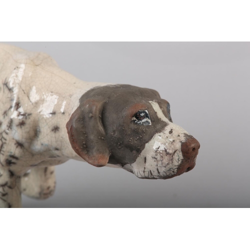 57 - KEZA RUDGE (British 1966) GUN DOG, studio pottery with raku glaze, incised signature to underside, 1... 