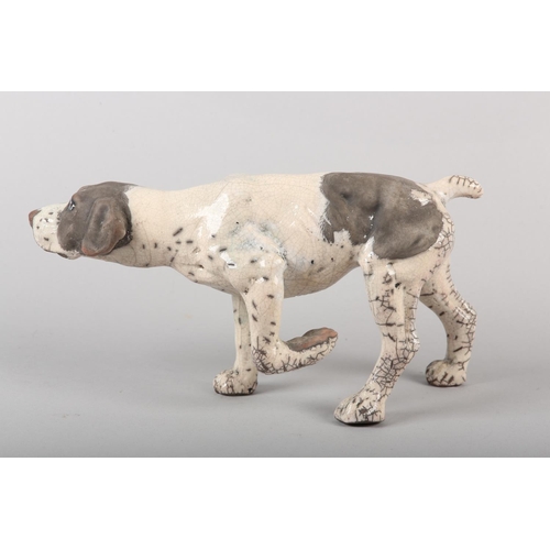 57 - KEZA RUDGE (British 1966) GUN DOG, studio pottery with raku glaze, incised signature to underside, 1... 