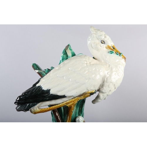 52 - A 19TH CENTURY MAJOLICA STICK STAND, modelled by Jospeh Holdcroft, as a stork standing beside bullru... 