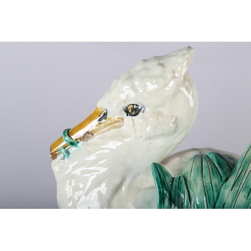 52 - A 19TH CENTURY MAJOLICA STICK STAND, modelled by Jospeh Holdcroft, as a stork standing beside bullru... 