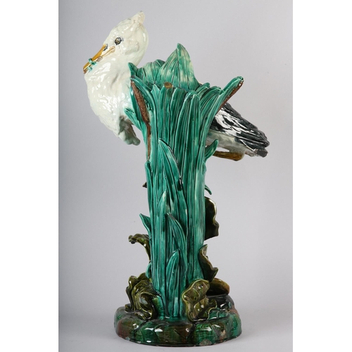 52 - A 19TH CENTURY MAJOLICA STICK STAND, modelled by Jospeh Holdcroft, as a stork standing beside bullru... 