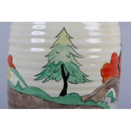 53 - A CLARICE CLIFF SINGLE HANDLED JUG OF LORNA PATTERN, c.1936, the ribbed body painted with a cottage ... 