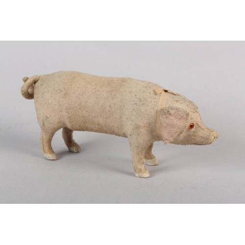 20 - A LATE 19TH/EARLY 20TH CENTURY PINK FELT PIG, probably German, with squeak concertina (at fault), wi... 