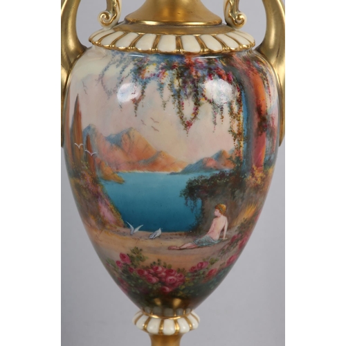 39 - A ROYAL WORCESTER PORCELAIN TWO HANDLED VASE SIGNED BY WALTER SEDGLEY, painted with a semi-clad fema... 