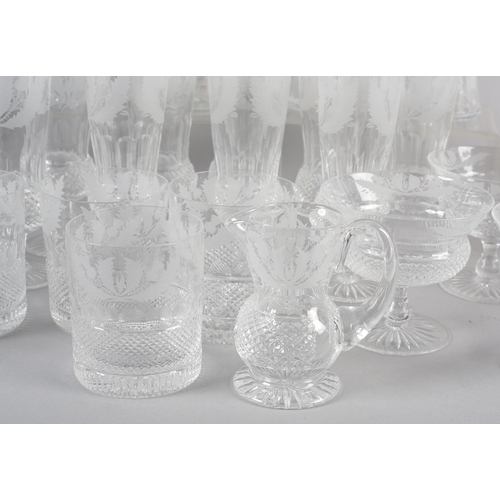 139 - A LARGE SUITE OF EDINBURGH CRYSTAL TABLE GLASS OF THISTLE PATTERN, to include claret jug 31cm, decan... 
