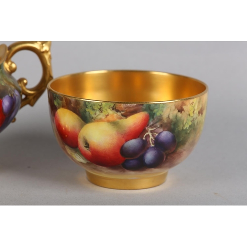 43 - A ROYAL WORCESTER FRUIT PAINTED CREAM JUG, signed by W Bee, the compressed body with apples and grap... 