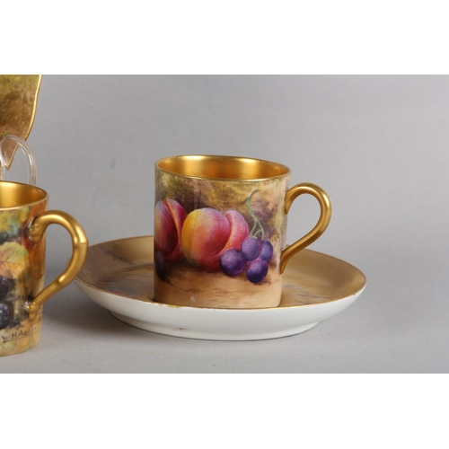 48 - A ROYAL WORCESTER COFFEE CAN AND SAUCER, A PLATE (16CM) AND A FURTHER COFFEE CAN AND ASSOCIATED SAUC... 