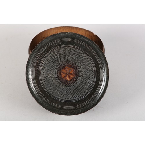 37 - A 19TH CENTURY ELM DRUM SHAPED BOX, the turned cover inlaid with a six point star to the centre, int... 