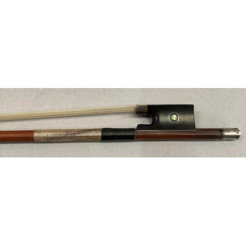 296 - AN EARLY 20TH CENTURY VIOLIN BOW BY VICTOR FETIQUE, silver mounted and inlaid with abalone, stamped ... 