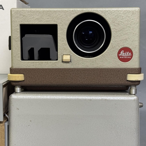 A boxed Leica Pradovit 150 IR slide projector and a Leitz Wetzlar