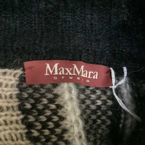 267 - A Max Mara co-ordinated knitwear including Max Mara Studio black, biscuit and off-white over-jumper,... 